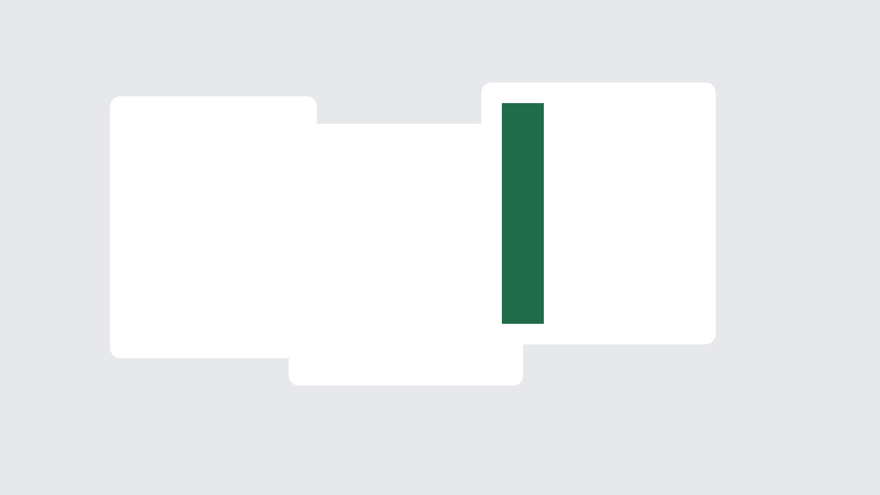 Three pale cards, one marked with a green tab